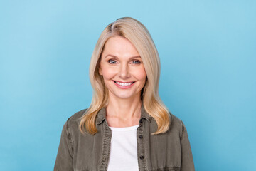 Portrait of lovely lady startup expert toothy smiling in camera isolated on sky light color background