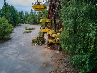 Aerial view of old abandoned Ferris wheel in the amusement park in the ghost town Pripyat Ukraine....