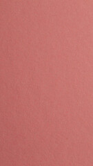Fototapeta premium brown background with thick paper texture. uneven lighting. Vertical image.