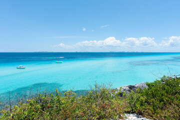 Fototapeta na wymiar Aerial view of the coast and the Caribbean Sea of the southern tip of Isla Mujeres in Mexico