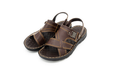 Pair of brown leather fashion sandals close-up on a white background