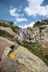 Fototapeta na wymiar Waterfall in the Vall de Incles in Andorra in spring 2022