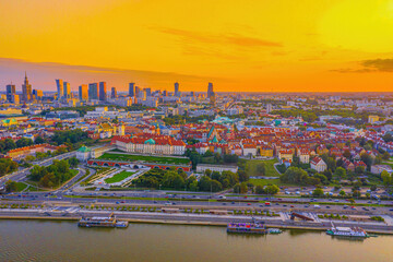 Panorama of Old Town and downtown of Warsaw from drone perspective during sunset
