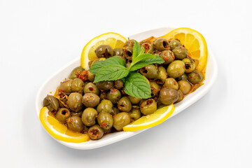 Green olive. Olives with special sauce isolated white background. Healthy food. close up