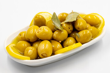 Green olives stuffed with cheese. Cheese filled olives for breakfast on isolated white background....