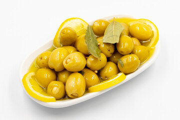 Green olives stuffed with cheese. Cheese filled olives for breakfast on isolated white background....