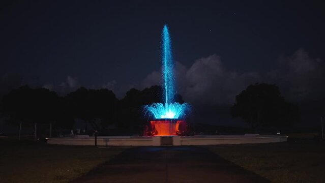 Fountain At Mission Bay Of Auckland City, New Zealand At Night With Led On Lights On