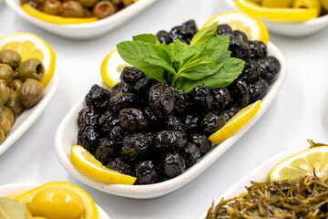 Olives. Varieties of olives on white background. Healthy food. Selective focus olive. close up
