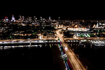 Warsaw, Poland  Cityscape with high angle above aerial view of historic architecture buildings in old town market square at night
