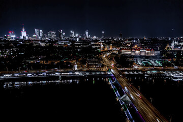 Warsaw, Poland  Cityscape with high angle above aerial view of historic architecture buildings in old town market square at night
