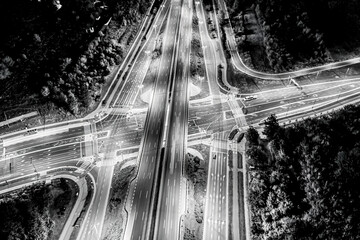 Aerial view of landscape perfect night road, top view at night traffic long exposure. color tone...