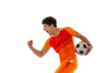 Winner emotions. Portrait of young man, football, soccer player posing with ball isolated on white...