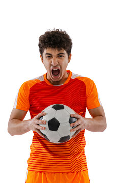 Winner emotions. Portrait of young man, football, soccer player posing with ball isolated on white studio background. Concept of sport, match