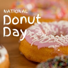 Composite of national donut day text with sprinkles on donuts, copy space