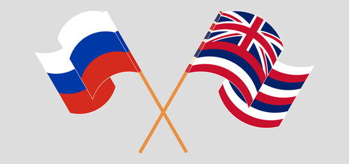 Crossed and waving flags of Russia and The State Of Hawaii