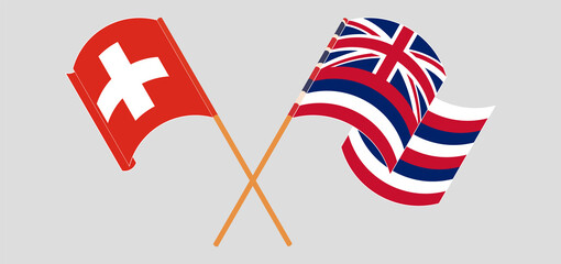 Obraz premium Crossed and waving flags of Switzerland and The State Of Hawaii