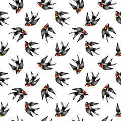 Fototapeta na wymiar seamless background with swallows in the style of an old-school tattoo. 