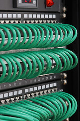 Connecting patch cords to Ethernet switches in a rack for data centers.