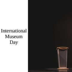 Composite of podium on dark stage and international museum day text on white background