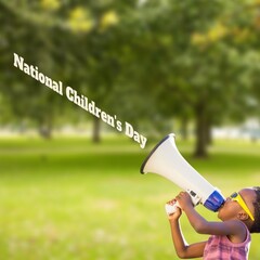 Digital composite of national children's day text by african american boy shouting from megaphone