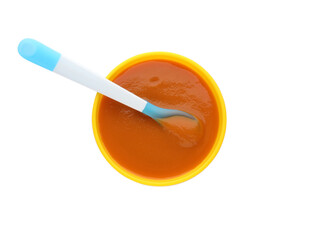 Healthy baby food in bowl on white background, top view