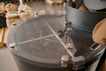 Close up of coffee roasting machine in small coffee manufacturing