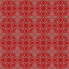 Fototapeta na wymiar Seamless oriental ethnic knitted pattern. Seamless knitted ornamental vector pattern in red and white colors as fabric texture, pattern for knitting, design, decoration