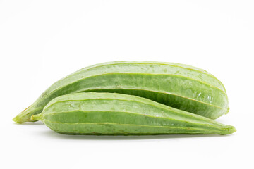 two Angled luffa or Ridge gourd isolated on white background.