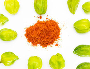 Spicy naga chili with red chili powder isolate on white background, top view