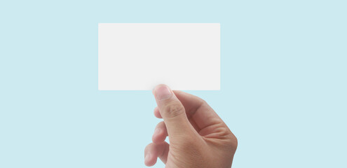 Close up of hand holding virtual card with. Credit card