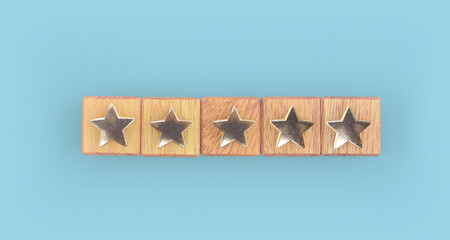 Wooden blocks with the five star symbol Increase rating