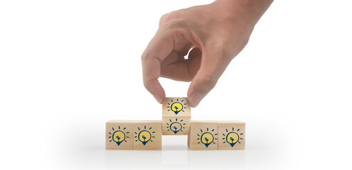 Fototapeta premium Wooden cubes in hand with copy space for input wording