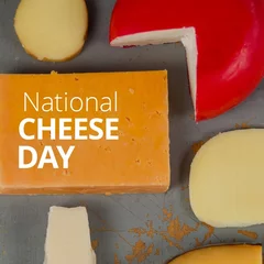 Tuinposter Digital composite of national cheese day text with various cheese arranged on table, copy space © vectorfusionart