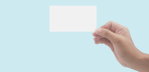 Close up of hand holding virtual card with. Credit card