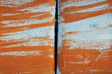 Rusty, painted over metal background