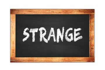 STRANGE text written on wooden frame school blackboard.