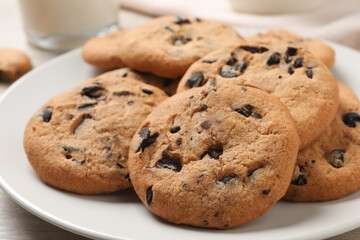 Delicious chocolate chip cookies on plate, closeup