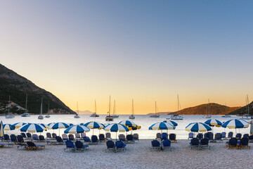 Fabulous spring sunset view of Avali Beach. Colorful evening seascape of Ionian sea. Fantastic outdoor scene of Lefkada Island, Greece, Europe. Beauty of nature concept background.