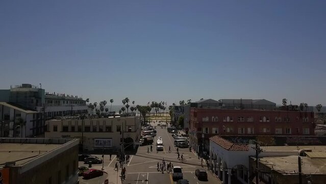 Venice Sign Windward Pacific Ave Eggslut, Public Art Wall, High Rooftop Lounge 
Fantastic aerial view flight rising up drone footage on LA Beach USA 2018 Cinematic view from above by Philipp Marnitz