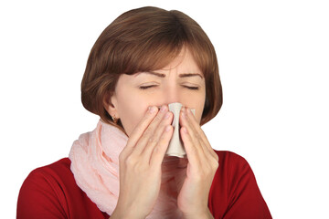 Portrait of sick woman in scarf sneezing in napkin, cleaning running nose and coughing, suffering influenza