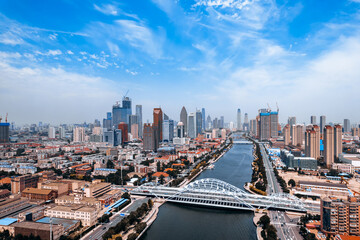 Aerial photography of the city skyline of Haihe Zhigu and Zhigu Bridge in Tianjin, China © Govan