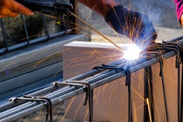 Welding the steel part by manual,fire spark