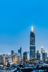 Fototapeta premium Night view of Zifeng Tower and city skyline in Nanjing, Jiangsu, China