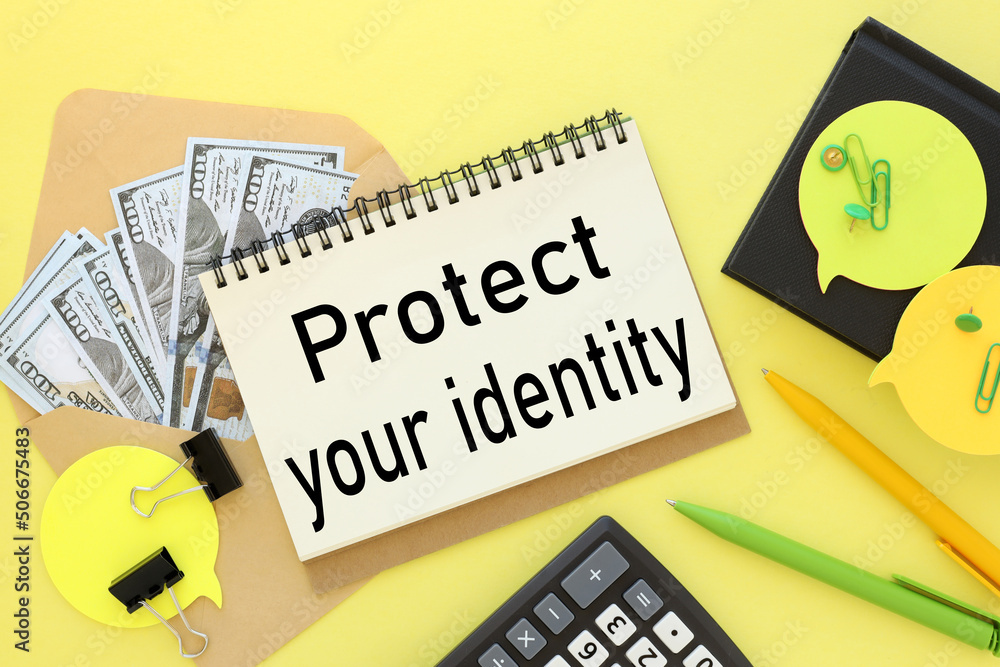 Poster protect your identity . text on an open notepad on an envelope near green and yellow stickers. yello