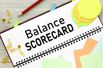 BALANCED SCORECARD desktop scheduler. text on the page. colorful stickers