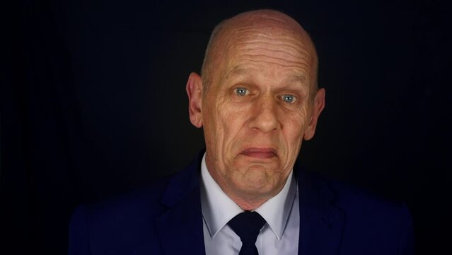 A clueless businessman looking dumbfounded