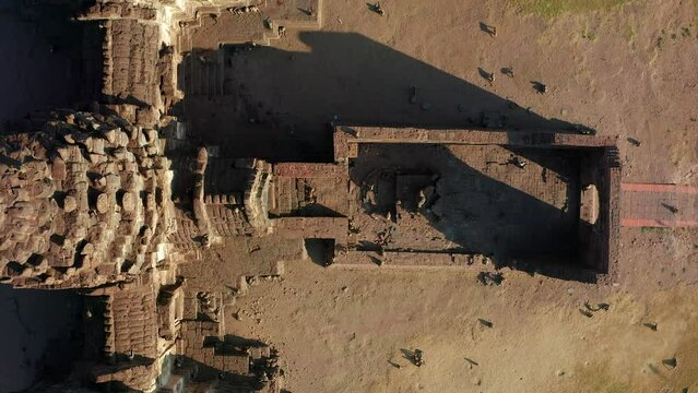 Aerial view of Pra Prang Sam Yod or Phra Prang Sam Yot ruin temple with monkeys, in Lopburi, Thailand