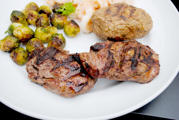 Grilled Beef Tenderloin Steaks Served with Side Dishes