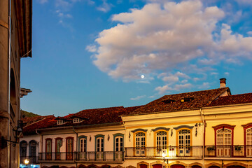 Obraz premium Facades of old colonial style houses with their balconies and windows in the historic city of Ouro Preto in Minas Gerais, Brazil
