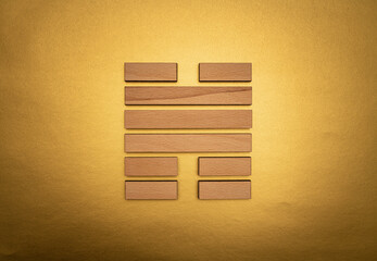 Gene Key 31 hexagram I ching wood on golden background